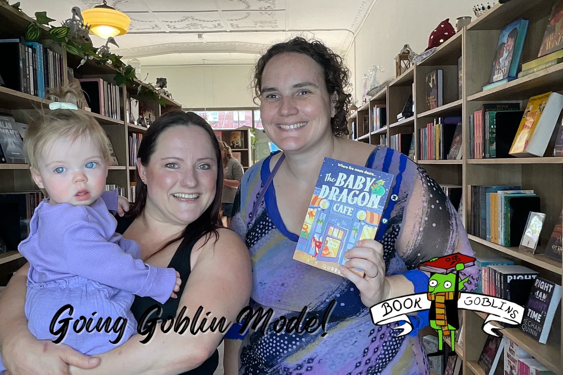 Friends using a photo booth installed at a bookshop