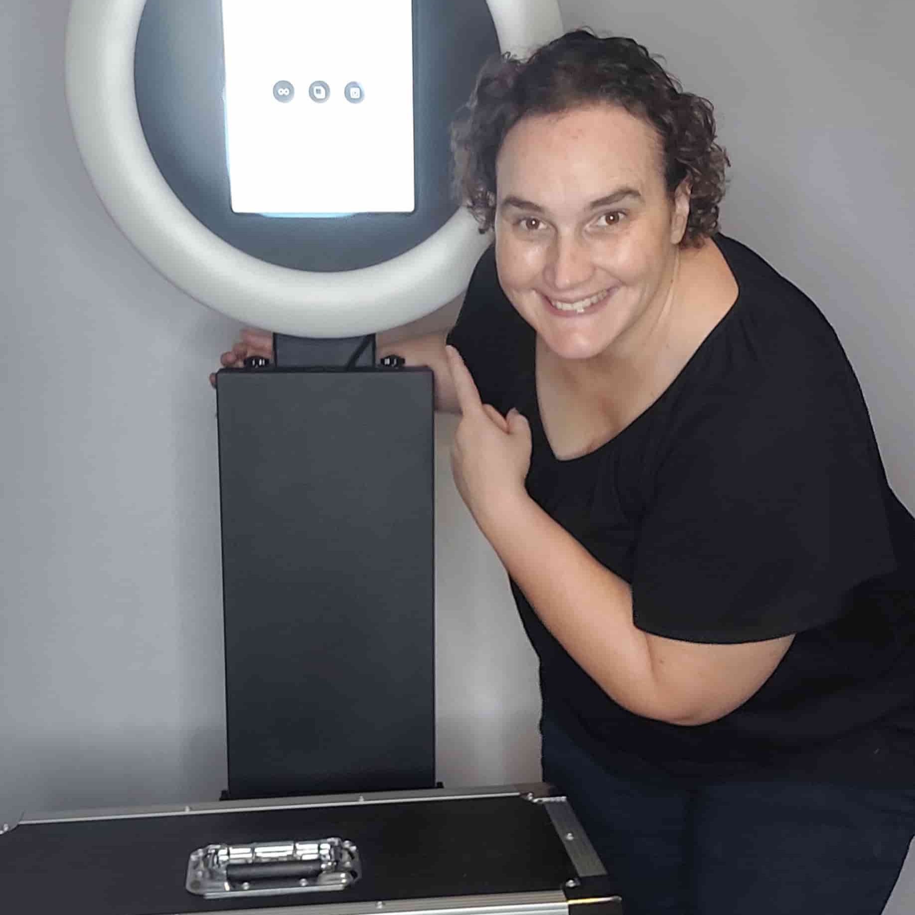 Owner displaying photo booth and carry case in Brisbane